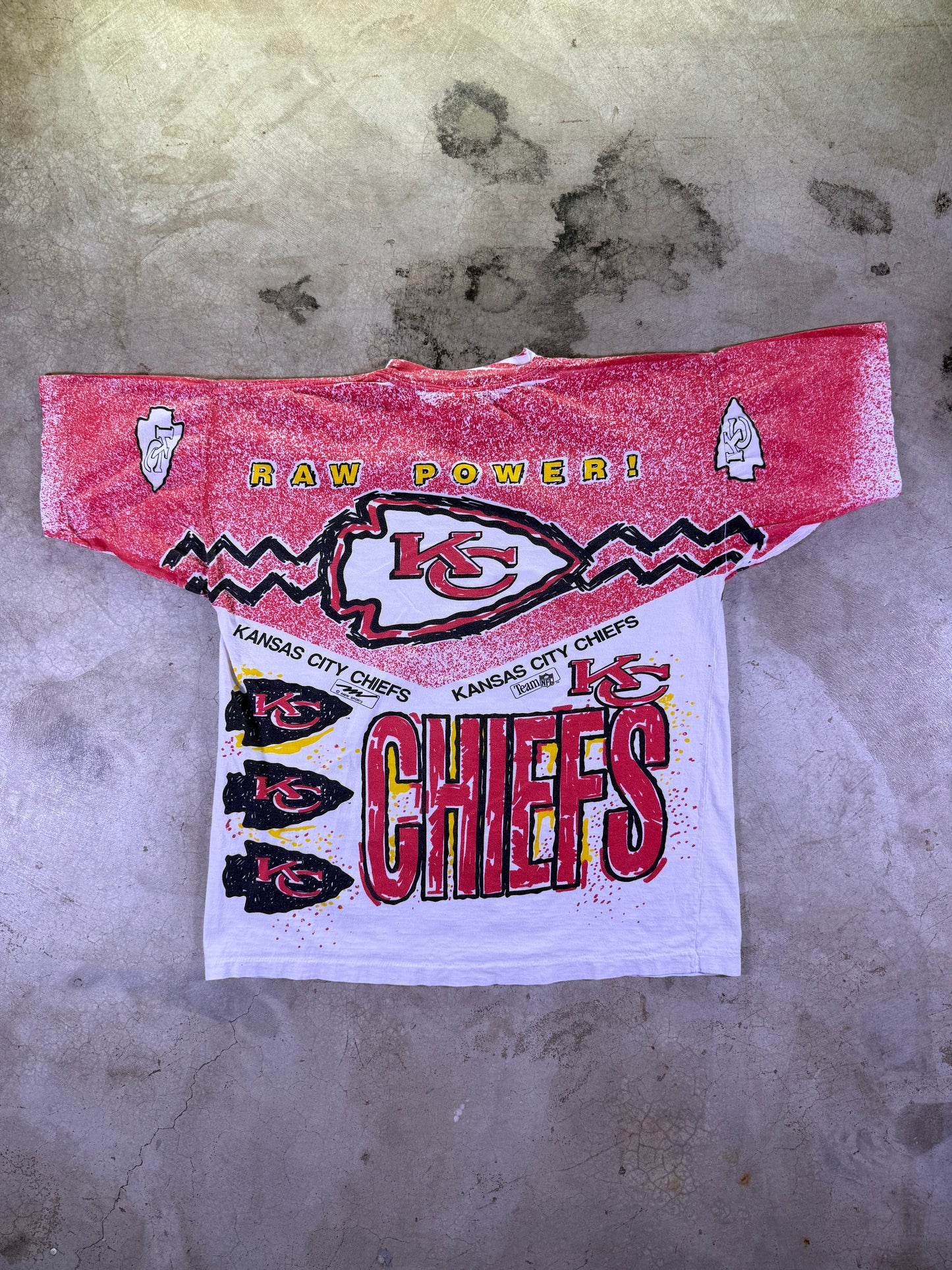 (L) Magic Johnson T’s x NFL KC Chiefs Raw Power all over print t shirt